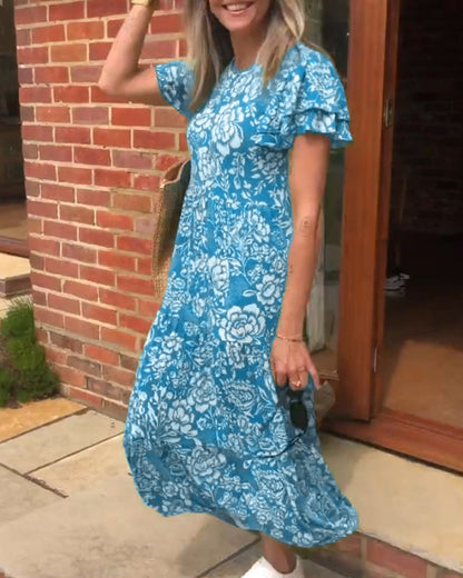 Maas & Mode® | Lange jurk met korte mouwen en bloemenprint