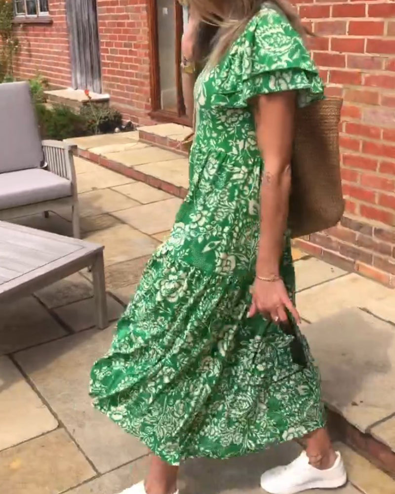 Maas & Mode® | Lange jurk met korte mouwen en bloemenprint