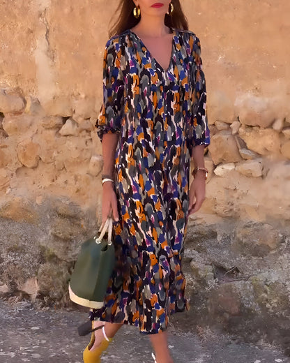Maas & Mode® | V-hals jurk met retroprint