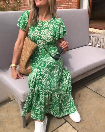 Maas & Mode® | Lange jurk met korte mouwen en bloemenprint