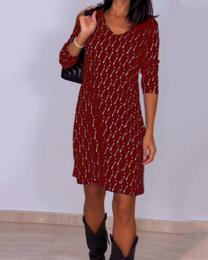 Maas & Mode® | Jurk met V-hals en ruitjespatroon
