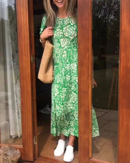 Maas & Mode® | Lange jurk met korte mouwen en bloemenprint