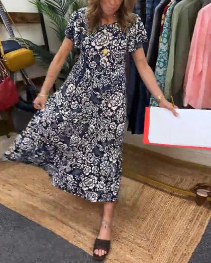 Maas & Mode® | Lange jurk met korte mouwen en bloemenprint