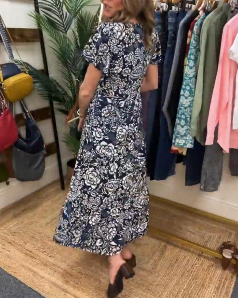 Maas & Mode® | Lange jurk met korte mouwen en bloemenprint